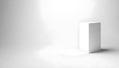 A white cube is placed on a plain white background, creating a stark and minimalist visual composition