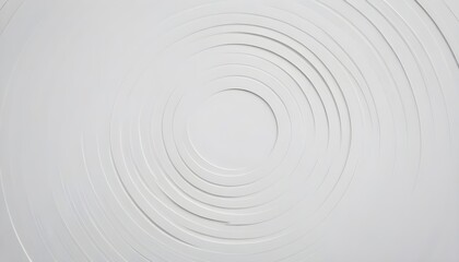 A white wall with a spiral pattern painted in black, creating a mesmerizing visual effect