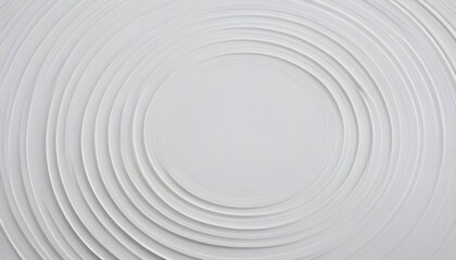 A white wall adorned with a precise and orderly circular pattern, creating a striking visual contrast
