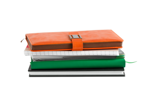 Composition with stack of notepads isolated on white.