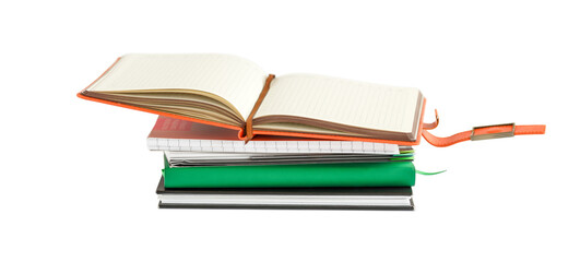 Opened blank notepad on a stack of closed notepads isolated on a white background.