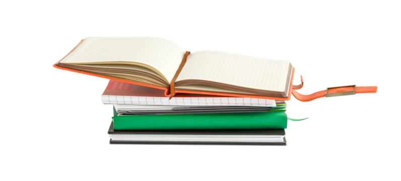 Opened blank notepad on a stack of closed notepads isolated on a white background.