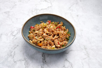 Rice with chicken fillet and vegetables,
