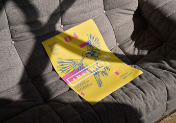 Mockup of customizable vertical poster on couch