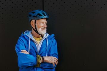 Elderly man, cyclist traveling through the city by bike. Senior city commuter.