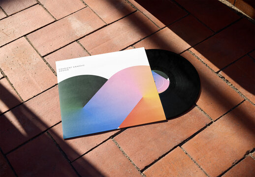 Mockup of customizable LP album in sleeve on bricks