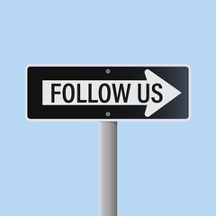 A sign with an arrow and the text "follow us" on a light blue background