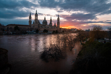 Sunset Splendor: Reveling in the Vibrant Hues of Zaragoza's Skyline as the Sun Sets in a Blaze of...
