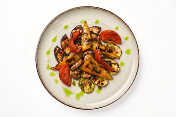 Vegetarian appetizer of grilled vegetable medley with spicy dressing
