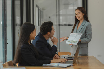 working together in workplace, exchange an idea to each other with a team for more perspective of how to do work well, a group of businesspeople is planning about new project