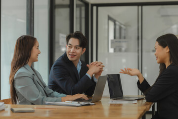 working together in workplace, exchange an idea to each other with a team for more perspective of how to do work well, a group of businesspeople is planning about new project