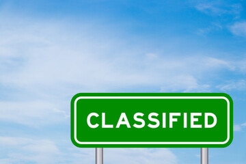 Green color transportation sign with word classified on blue sky with white cloud background