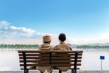 Serene Lake View with Couple on a Bench