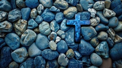 peace christian cross made of stones
