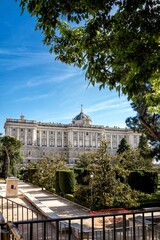 Fototapeta premium View of the emblematic royal palace of Madrid and the Sabatini gardens that are in front of one of its facades