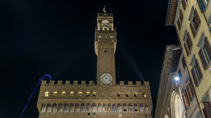 Famous Arnolfo tower of Palazzo Vecchio timelapse on the Piazza della Signoria at twilight in...
