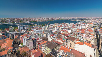 Obraz premium The view from Galata Tower to Galata Bridge timelapse Golden Horn, Istanbul, Turkey