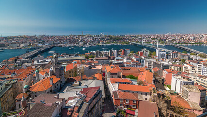 Obraz premium The view from Galata Tower to Galata Bridge timelapse Golden Horn, Istanbul, Turkey
