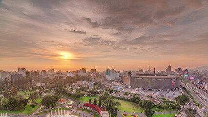 Aerial sunset view of the National stadium in the Peruvian capital Lima with Park of the Reservey timelapse