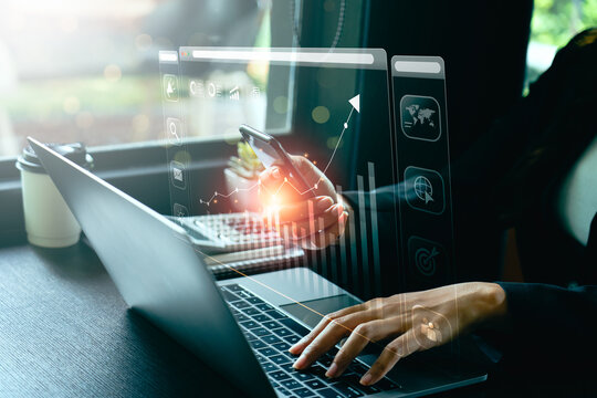 Businessman using laptop and analyzing economic growth, financial graph and business investment. planning strategy, stock market statistics, stock market trends, technical analysis strategy, value