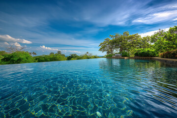 tropical island in the ocean, Swimming pool on a hotel or resort. Immerse yourself in luxury with...