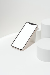 White blank screen smart phone mockup, template on geometric pedestal
