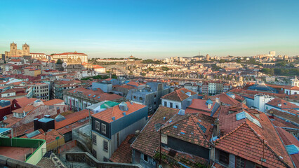Sunset time, shadow covering Douro riverside with the Dom Luiz bridge timelapse, Porto , Portugal.