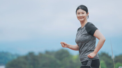Joyful Woman Engaged in Outdoor Fitness Routine