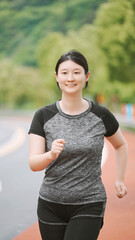 Young Woman Enjoying a Healthy Run in the Park