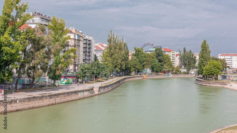 Wall mural vienna cityscape with the danube channel timelapse in vienna. austria.