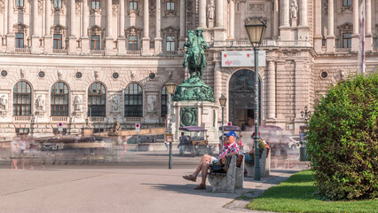 Naklejka premium Equestrian statue of Prince Eugene of Savoy timelapse in front of Hofburg palace, Heldenplatz, Vienna, Austria.