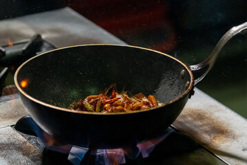 Close up of cooking in the frying pan.