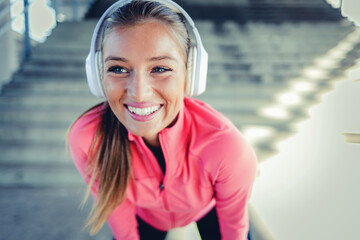 Music earphones, fitness and portrait of happy woman listening to outdoor wellness song, exercise...