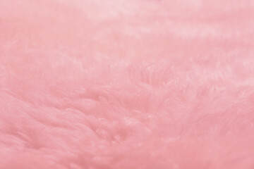 pink sheepskin texture with soft hairs, natural fur for designer, the concept of processing, production of furrier products, stress relief, psychological stress