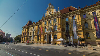 Fototapeta premium A view of the Museum of Arts and Crafts timelapse hyperlapse in Zagreb during the day. Croatia