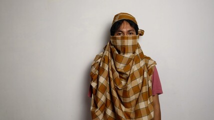 The thief from Indonesia wore a sarong face covering and could not be recognized