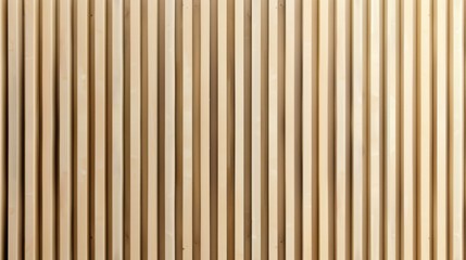 Wall made of wood. Wooden panels made of vertical slats. Maple pattern texture. Modern interior design facade made of timber. Strips of boards in the construction of a facade or fence.