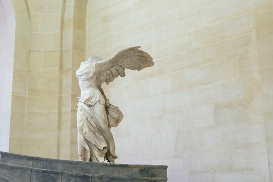 Paris, France - May 3, 2019: The Winged Victory of Samothrace, or the Nik&eacute; of Samothrace, a masterpiece of Greek sculpture from the Hellenistic era.