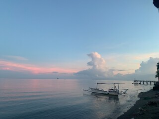 morning sun in Bali, Indonesia. Traditional fishing boats at Sanur Beach, Bali, Indonesia.