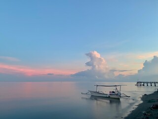 morning sun in Bali, Indonesia. Traditional fishing boats at Sanur Beach, Bali, Indonesia.