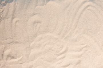 beach concept, sea stones and rope on the beach