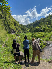 three young men go on an adventure in the nature around Mount Merapi, Yogyakarta