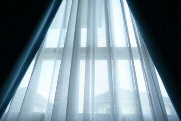 Obraz premium black and white curtain on the window in home, interior design