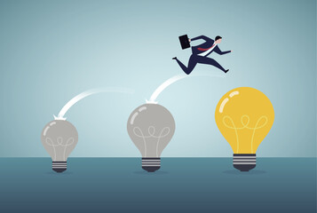 Business transformation concept. Moving to a better innovative company, adapting to a new concept, Businessman jumping from old to new shiny light bulb idea.