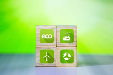 Concept of carbon footprint and reduced carbon emission. Carbon footprint symbols on a wooden cube...