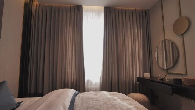 the curtains on the electric motor or electric curtain rod are opened