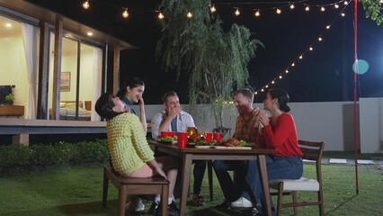 Family gather celebrate holiday. Parents, grandparents and girl together to talk and have dinner...