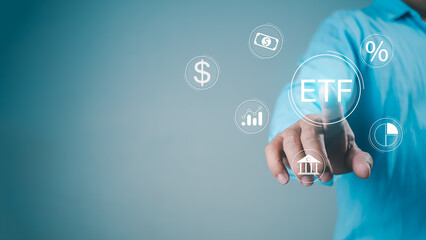 Businessmen use your fingers touch icons of ETF Exchange traded fund stock market trading investment financial concept, Investment Opportunities in Mutual Funds and ETFs.