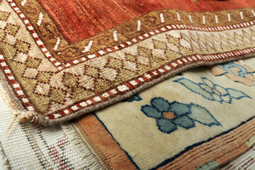 Textures and patterns in color from woven carpets