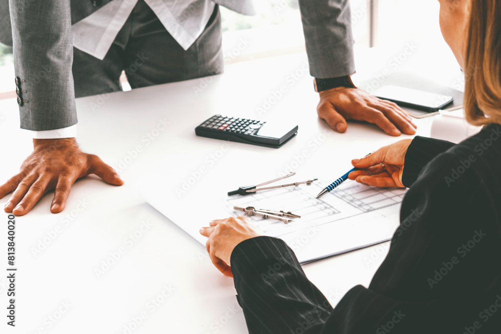 Poster architect and engineer working with construction drawing project on table in office. architecture an